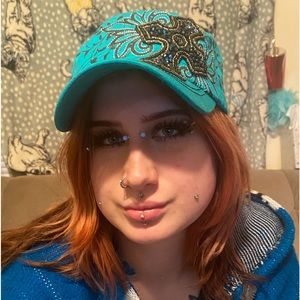 Cute rhinestone hat with cross on top.new with tags.Kbethos brand Iaccept offers